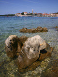 Rock Shoreline Near Padova Cove with Historic Centre of Rab Town Beyond and its Four Bell Towers