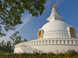 Nipponzan Myohoji Stupa, on Top of Ratnagiri Hill, with Four Golden Statues of Buddha