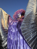 Masked Person in Costume with Silver Wings Near St.Mark's Square