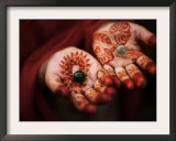 Pakistani Girl Displays Her Hands Painted with Henna Paste