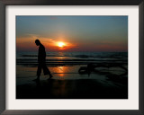 Buddhist Monk Walks Along the Beach During Sunset in Khoa Lak, Thailand - Party Travel