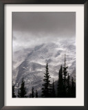 Emmons Glacier Reflects a Bit of Sunlight as Clouds Cover the Summit of Mount Rainier