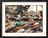 Kashmiri Eartquake Survivors Pray Amid the Debris of a Destroyed Building During the Eid Al-Fitr