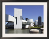 A Ring-Billed Gull Takes Flight in Front of the Rock and Roll Hall of Fame and Museum