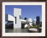 A Ring-Billed Gull Takes Flight in Front of the Rock and Roll Hall of Fame and Museum
