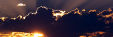 Sun Rising Behind Dark Clouds, Montana