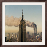 Twin Towers of the World Trade Center Burn Behind the Empire State Buildiing, September 11, 2001