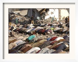 Kashmiri Eartquake Survivors Pray Amid the Debris of a Destroyed Building During the Eid Al-Fitr