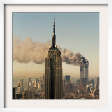Twin Towers of the World Trade Center Burn Behind the Empire State Buildiing, September 11, 2001