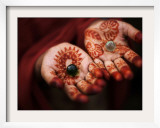 Pakistani Girl Displays Her Hands Painted with Henna Paste