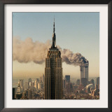Twin Towers of the World Trade Center Burn Behind the Empire State Buildiing, September 11, 2001