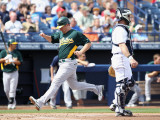 Oakland Athletics v San Diego Padres, PEORIA, AZ - MARCH 06: Cliff Pennington and Gregg Zaun
