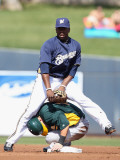 Oakland Athletics v Milwaukee Brewers, PHOENIX, AZ - MARCH 03: Rickie Weeks and Daric Barton