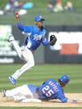 Kansas City Royals v Texas Rangers, SURPISE, AZ - FEBRUARY 27: Alcides Escobar and Mike Napoli