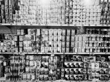 Rows of Shelves Staked With Canned Goods in Supermarket