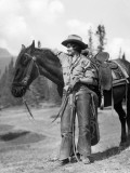 Woman With Arm Around Neck of Horse