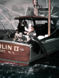 Deep Sea Fishing Boat, Man at Helm, Two Men on Stern