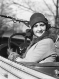 Woman in Convertible Car Wearing Cloche Hat
