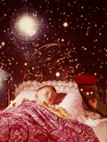 Little Boy Sleeping in Brass Bed With Christmas Stocking and Starry Dream Images