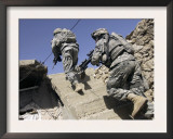Soldiers Running Up Staircase of a Building During a Mission in Mosul, Iraq