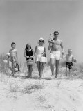 Buy Family of Five, in Bathing Suits, Walking Towards Beach, Carrying Parasol and Picnic at AllPosters.com