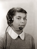 African-American Woman Wearing Headset As Telephone Operator