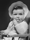 Baby Girl in Bonnet, Looking Away, Close-Up