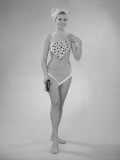 Portrait of Young Woman in One Piece Swimsuit, Studio Shot