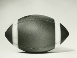 Rugby Ball Against White Background, Close-Up