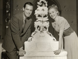 Honeymooners With Hotel Wedding Cake