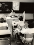 Teacher Conducts Grade School Class