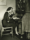 Woman Writing Letter at Bureau