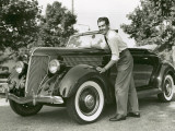 Man Polishing His Ford Car