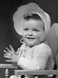 Cute Baby Wearing Bonnet