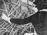 Female Telephone Switchboard Operator Connecting Caller