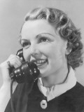 Young Woman Using Telephone, Close-Up