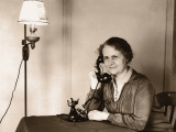 Mature Woman Holding Telephone To Ear