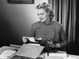 Woman Using Typewriter