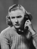 Young Woman Talking on Telephone