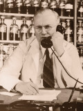 Buy Mature Doctor Talking on Telephone at AllPosters.com