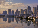 Vancouver Skyline With Boats in Harbor at Sunrise Seen From Stanley Park, British Columbia, Canada