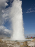 Buy Tourists Watch Strokkur Geyser Erupting, Geysir, Iceland at AllPosters.com