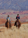 Buy Cowboy and Cowgirl Riding Through Scenic Hills of the Big Horn Mountains, Shell, Wyoming, USA at AllPosters.com