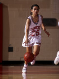High School Girls Basketball Player in Action