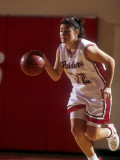 High School Girls Basketball Player in Action