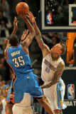 Oklahoma City Thunder v Denver Nuggets - Game Four, Denver, CO - April 25: Kevin Durant and Chris A