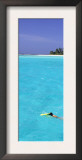 Woman Snorkelling at Sea Surface,Cocos Keeling Island in Background, Indian Ocean, Australia