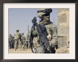 Us Army Soldier Armed with a Mk 48 Light Machine Gun, Provides Rear Security During Civil Affairs