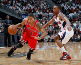 Chicago Bulls v Atlanta Hawks - Game Four, Atlanta, GA - MAY 08: Jeff Teague and Derrick Rose Photographic Print