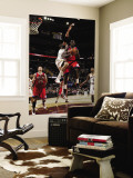 Philadelphia 76ers v Cleveland Cavaliers: Jrue Holiday and Anderson Varejao